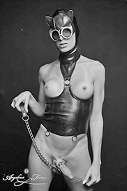 dominatrics Torres in leather costume